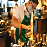 Starbucks to beef up store staffing, go slow on automation rollout