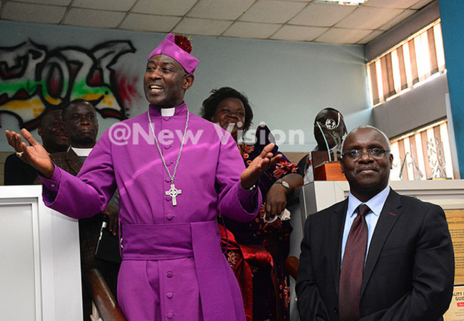  hurch of ganda rchbishop tephen aziimba during his recent visit at ision roup offices
