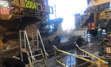 The damaged dozer and the knocked down step ladder.