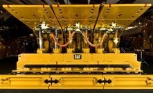 Cat longwall roof supports and face conveyor on display at a mining show