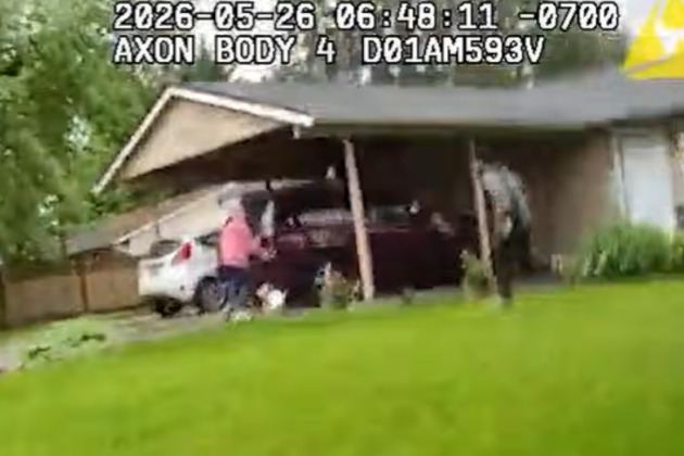 Body camera video shows man running at neighbor with knife before police shooting