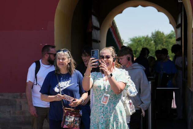 Update: China reports surge in foreign visitors amid expanded visa-free policy