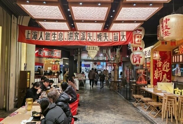 Explore bustling longtang alley life in Shanghai mall