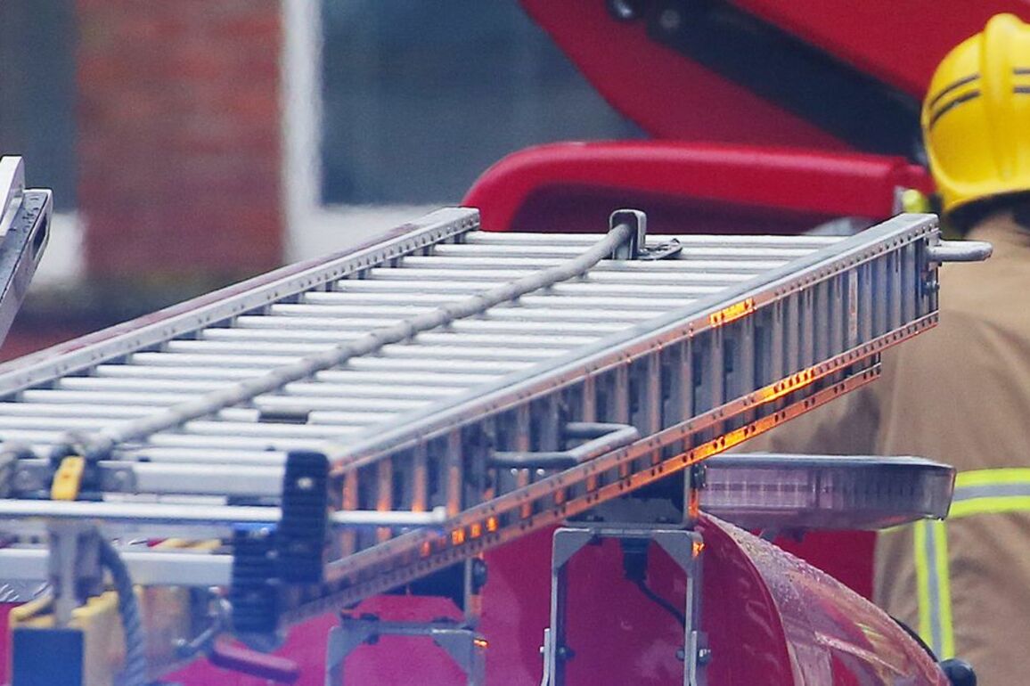 Belfast city centre apartment block evacuated after masked men started "number of fires"