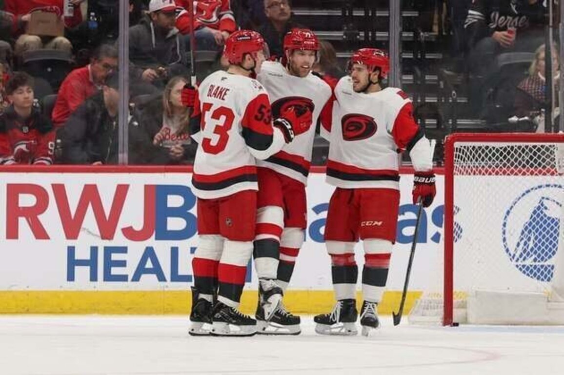 Taylor Hall's 2 points help Hurricane snap skid vs. Devils