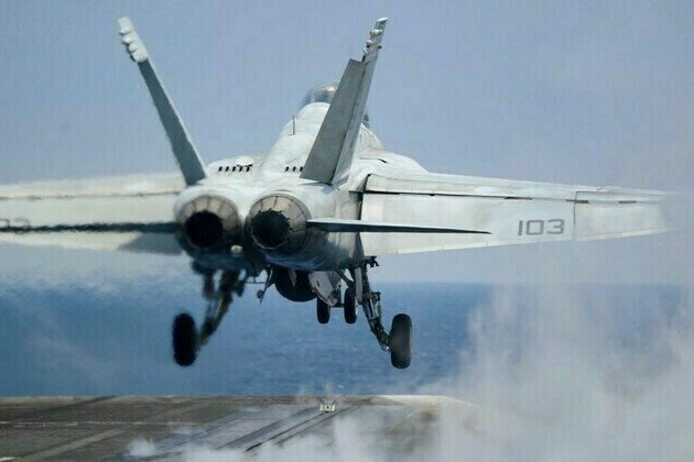 US launched largest-ever strike from aircraft carrier  commander