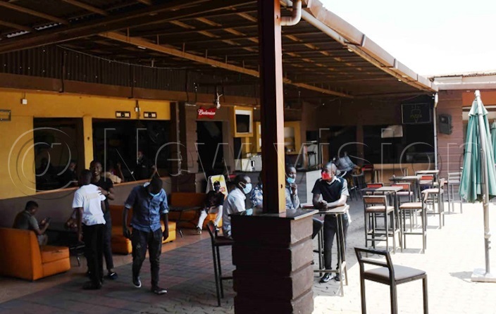 Mourners gathering at Nexus bar. Photos by Ignatius Kamya