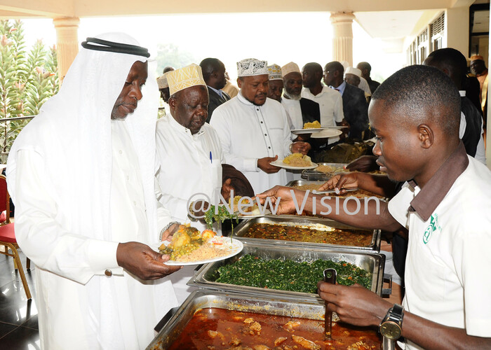  eputy ufti eputy ufti bdallah emambo irector for haria sheikh ahaya akungulu mbassador ahaya semuddu and others being served with food during induction workshop for egional adhis at rch partments in ampala on riday on ovember 1 2019 hoto by amadhan bbey 