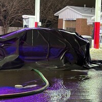 Brooklyn Center police officer uses cruiser to push burning electric Kia away from gas pumps