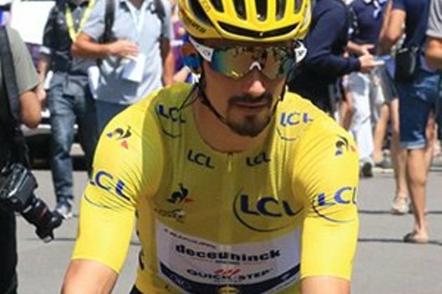 Sensational Alaphilippe wins time-trial, retains TDF lead
