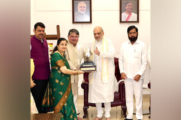 Union Home Minister Amit Shah presents Chhatrapati Sambhaji Maharaj Rajya Prerana Geet Puraskar to Veer Savarkar's family
