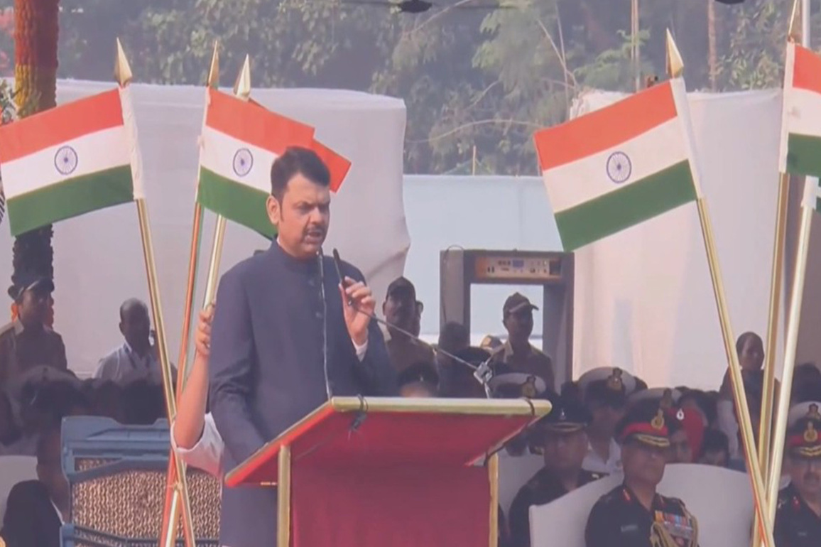 Maharashtra CM Devendra Fadnavis unfurls the national flag during 77th Republic Day celebrations in Mumbai