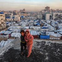 Gaza families salvage iron from ruins to reinforce tents as winter storms hit