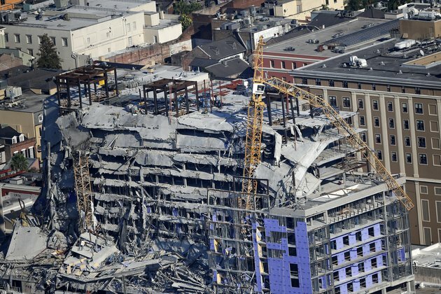 Leaning Cranes Toppled at Partly Collapsed New Orleans Hotel