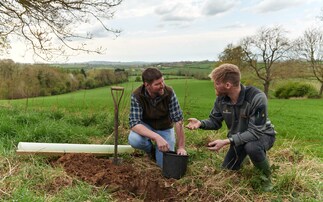 One of Morrisons' Tree Advisors speaks to a farmer as part of a new scheme | Credit: Morrisons