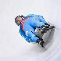 Italian men and women both win gold in luge doubles