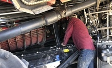  The Boekemans team fitting spiked rasp bars in the separation area of a Case IH 7250