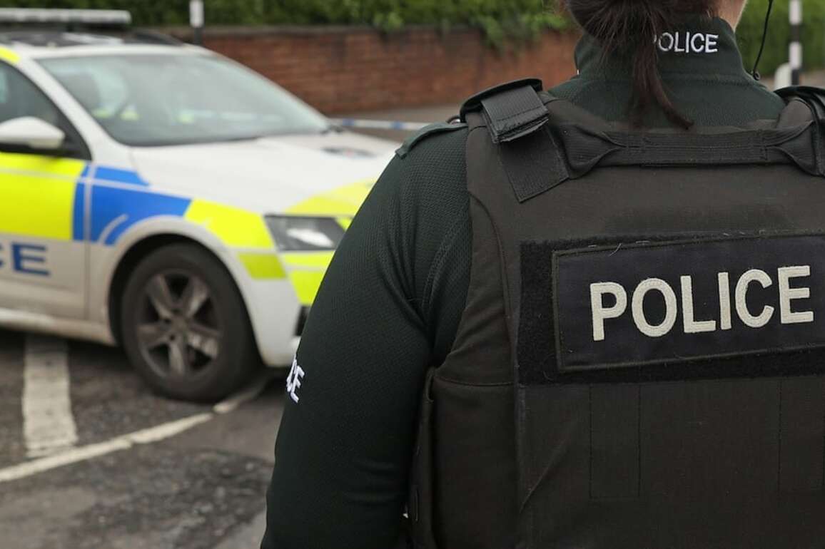 Man (50s) arrested in Belfast after two police cars rammed during pursuit  The Irish Times