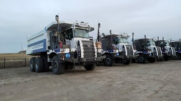 Trucks fitted with autonomous technology at the Zhundong open pit coal mine.