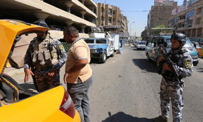 Baghdad area car bombs kill at least 30 Baghdad area car bombs kill at least 30