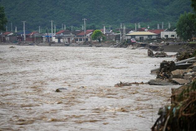 Update: All-out rescue efforts underway as rainstorms leave 30 dead in Beijing