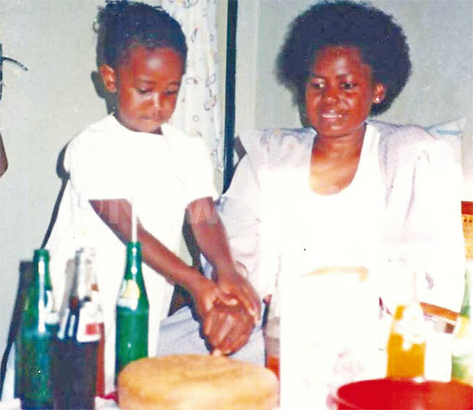  oung abalayo celebrating a birthday with her mother
