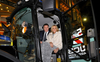 Scottish rugby legend Kenny Logan takes wife Gabby Logan in a Doddie Weir inspired tartan JCB tractor through Edinburgh  