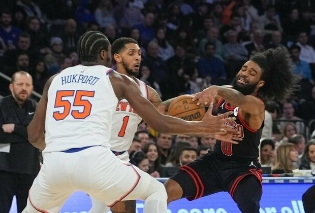 Short-handed Knicks need overtime to dodge Bulls