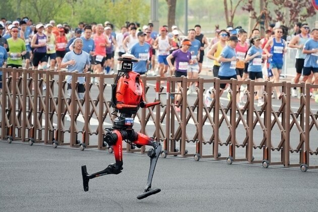 Humanoid robot shatters human half-marathon world record in Beijing