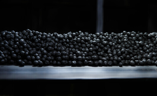 Iron ore pellets at Metinvest site.