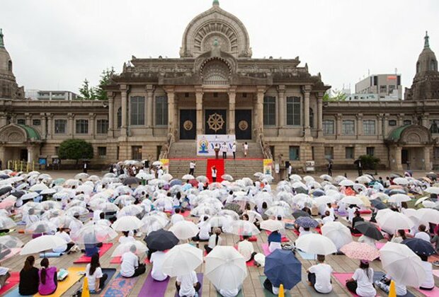 Amid rain Indian embassy organises Yoga Day celebrations in Tokyo