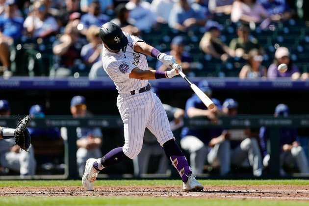 Rockies end 7-game slide to open twin bill with Dodgers