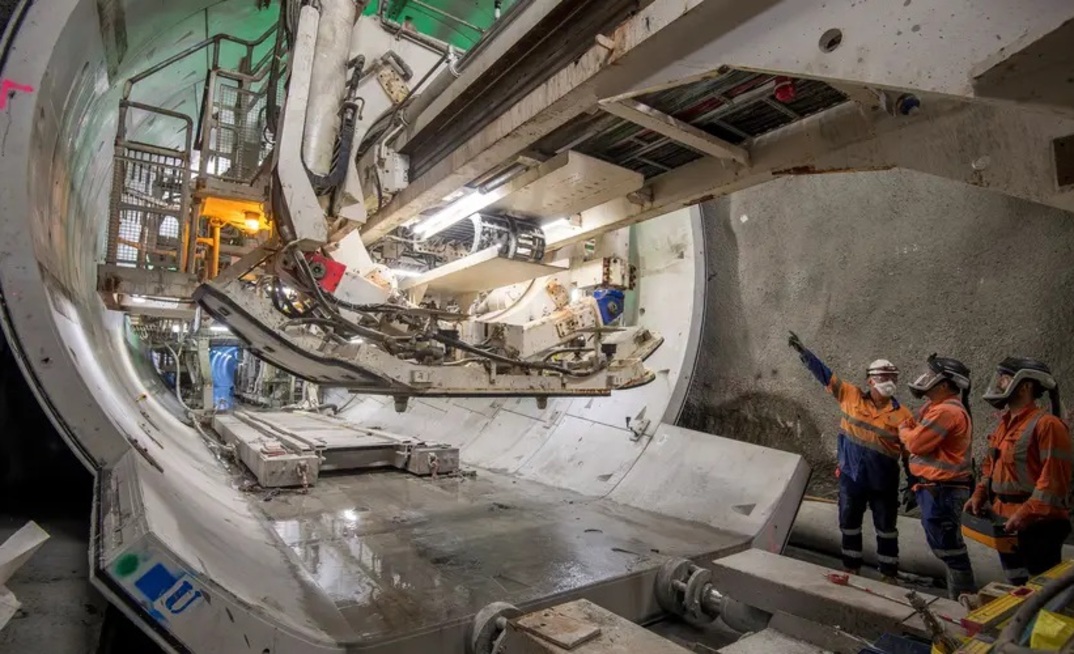 The lining erector machine used to line the mined service tunnels which form part of the Sydney Metro West project