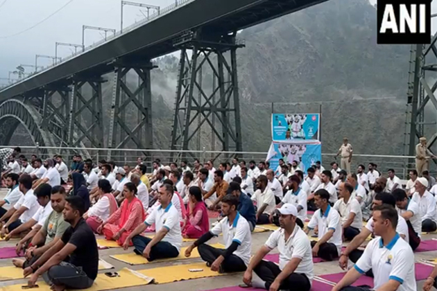 J-K: Yoga session held at Chenab Rail Bridge, world's highest railway bridge, in Reasi