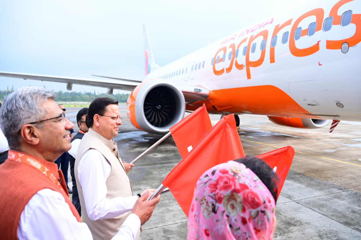 Uttarakhand CM flags off New Air India Express flight from Dehradun to Bengaluru