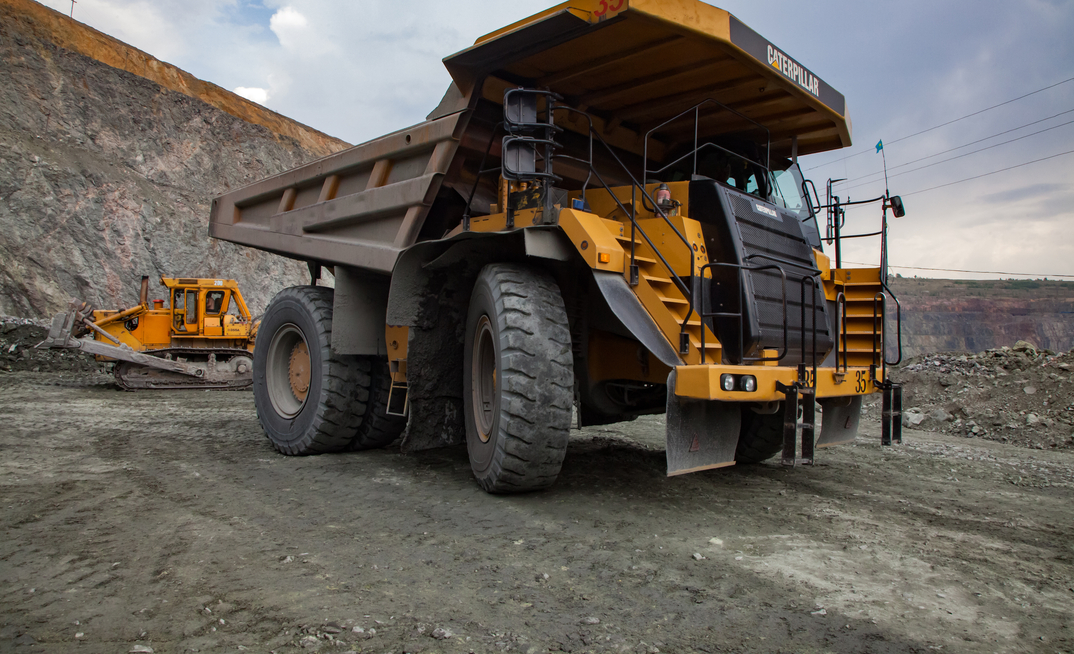 Caterpillar quarry truck transporting iron ore in Kazakhstan
