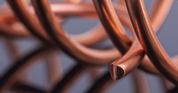 Copper gains and gold holds recent rise