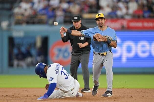 Brewers rally for 3 runs in ninth, overtake Dodgers in series opener