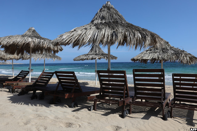  mpty sunbeds along a beach in the ypriot resort town of yia apa on ay 4 as the island country gradually eased lockdown restrictions