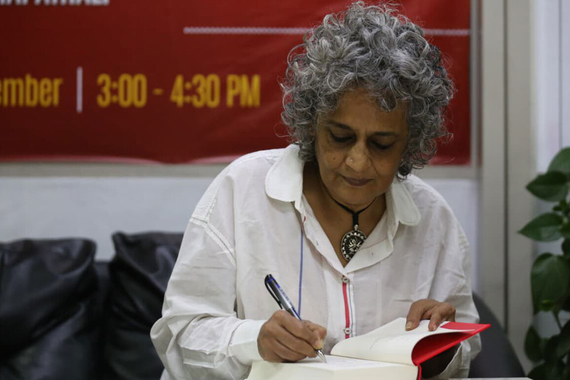 Arundhati Roy signs "Mother Mary Comes to Me" for her Nepali readers in Kathmandu