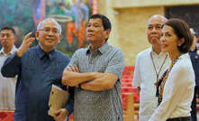 Philippines president Rodrigo Duterte (second from left) and environment minister Gina Lopez (far right)