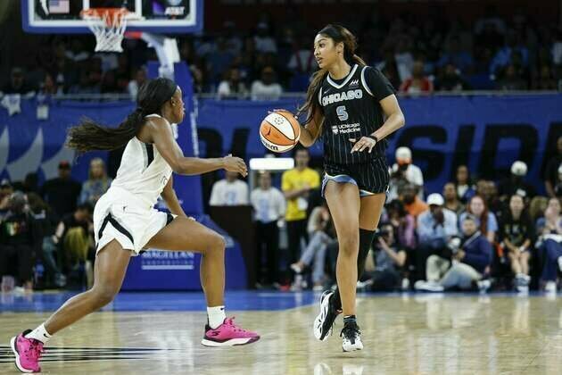 Aces win 11th straight, fend off gritty Sky