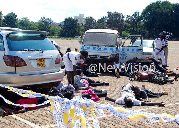  raffic police officer checking on some of the victims during a demonstration of mass causality drill