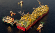 Workers on Prelude FLNG,  the world's largest vessel of its type, have stopped work over pay and conditions.