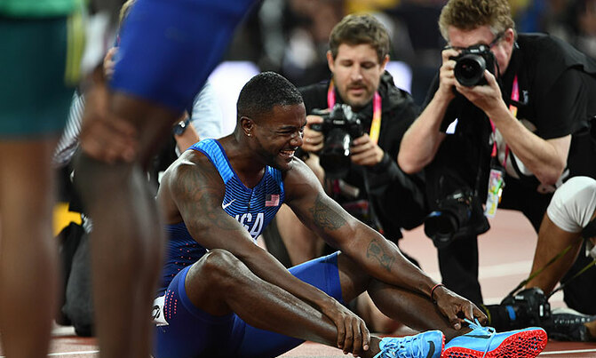 Boos as Gatlin stuns Bolt to win 100m world title Boos as Gatlin stuns Bolt to win 100m world title
