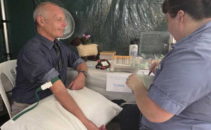 NSA chief executive, Phil Stocker, receiving tests at the NSA Sheep Event