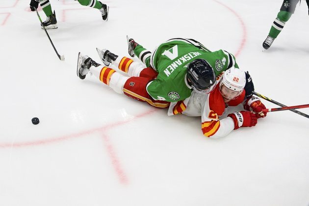 Flames roll in Game 4, draw level with Stars