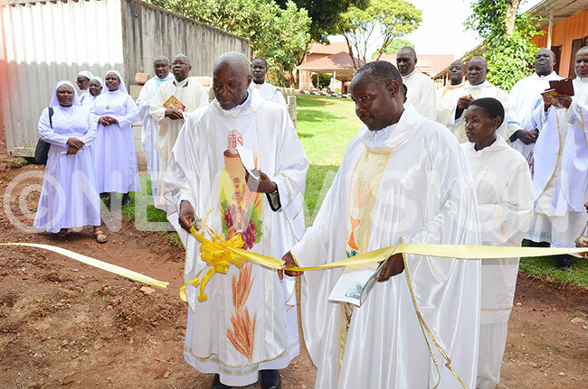  he hancellor of ampala rchdiocese r ius ale cuts tape to commission the physiotherapy unit of apeera akateyambas home alukolongo