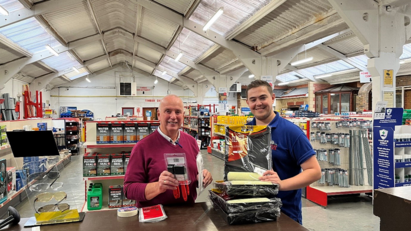 Robert Price donates decorating supplies to Bridgend Community Centre