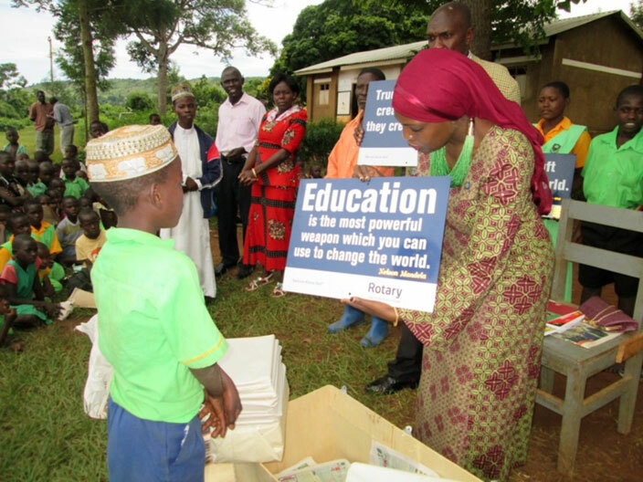  ajat ehmah asule displaying one of the messages for a talking compound at akijju rimary school 